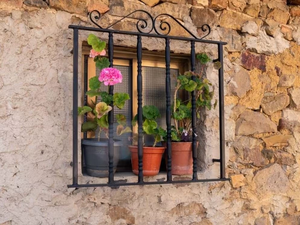 Contemporary grill window with integrated planters
