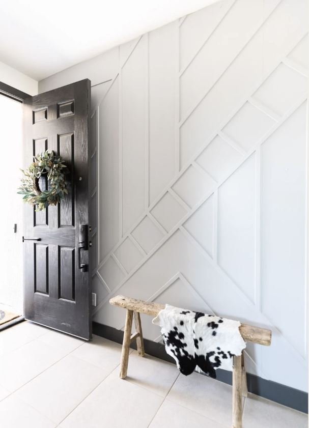 Minimalist small house entrance lobby design with clean décor