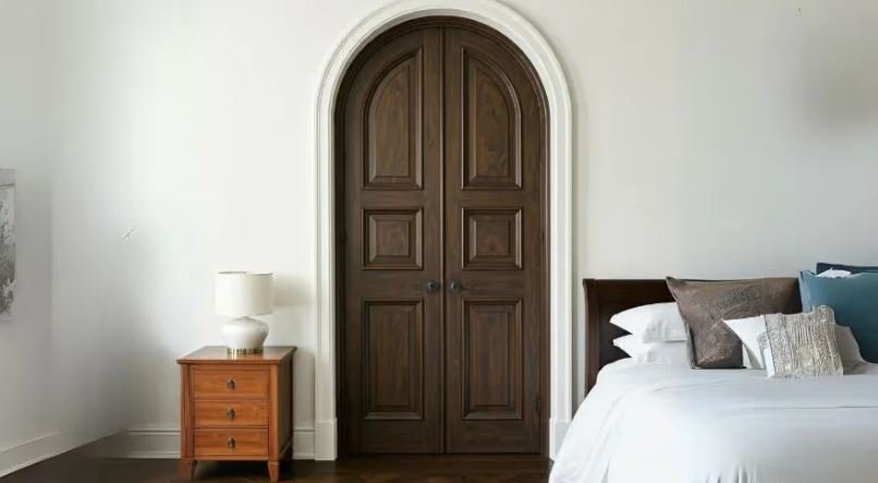Contemporary curved wooden bedroom door design