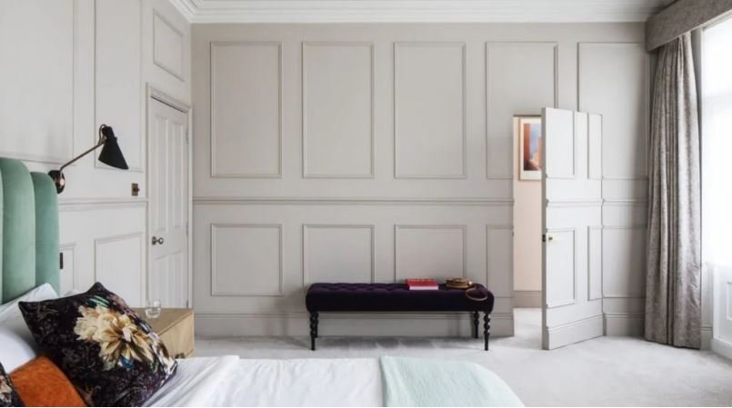 Hidden wooden bedroom door design with seamless finish