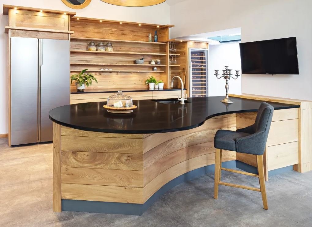 Curved breakfast counter design for a modern open kitchen