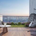 Modern high-rise apartment balcony garden with potted plants hanging chair and sweeping city skyline view