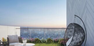 Compact Balcony Garden Styling Ideas for High-Rise City Apartments Modern high-rise apartment balcony garden with potted plants hanging chair and sweeping city skyline view