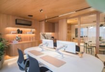 Ergonomic Home Office Layout Ideas for Productivity and Posture Wellness Modern ergonomic home office workstation with dual monitor setup wooden accents and task lighting