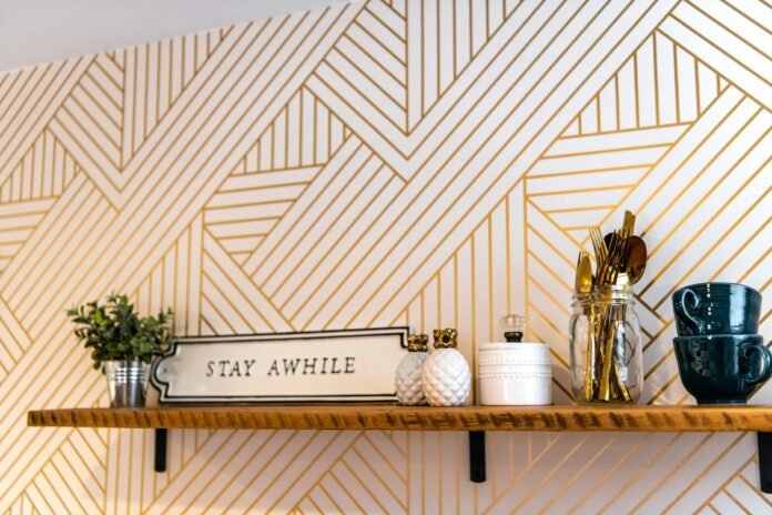 Handcrafted solid wood floating shelves mounted on a wall displaying decorative kitchenware and ceramics