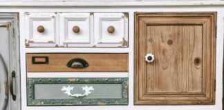 Upcycled Thrifted Furniture Painting and Distressing Techniques for Vintage Charm Vintage upcycled wooden cabinet with painted body natural wood tabletop and distressed antique detailing