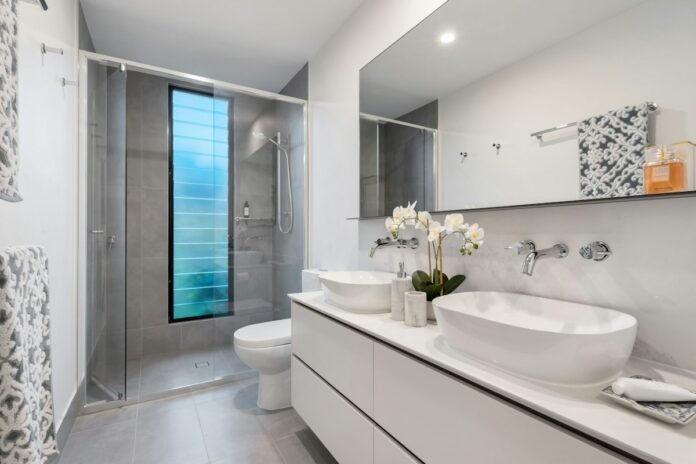 Modern small bathroom remodeling ideas with space-saving floating vanity and walk-in shower
