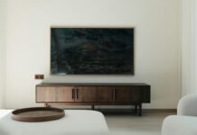Mid-Century Modern Teak Credenzas and Media Console Storage Arrangements Mid-century modern teak wooden credenza and media console with clean Scandinavian lines and curated living room accessories