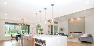 Quartz vs Granite Kitchen Island Countertops Heat Resistance and Stain Defense Luxury kitchen island featuring durable engineered quartz and natural granite countertop with modern cabinetry