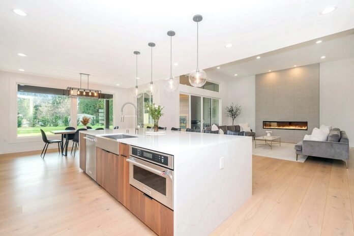 Luxury kitchen island featuring durable engineered quartz and natural granite countertop with modern cabinetry