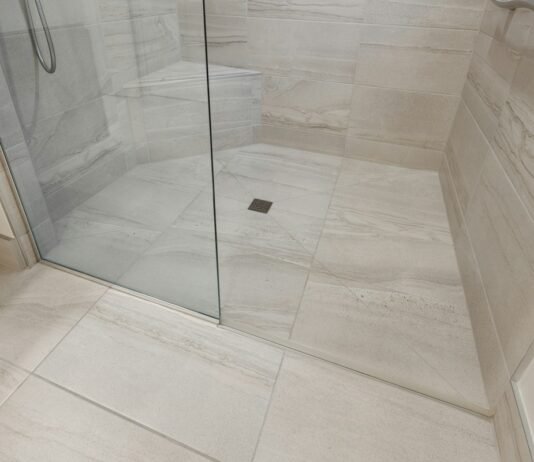 Walk-In Shower Tile Layout Inspirations for Contemporary Master Bathrooms Contemporary master bathroom walk-in shower tile layout with large format porcelain and recessed niche