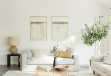 Warm Neutral Paint Color Palettes for Sunlit Living Rooms and Hallways Warm neutral paint color palette in a bright sunlit modern living room with natural wood finishes