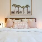 Layered bed styling masterclass showcasing duvets quilts and accent pillows in a modern luxury bedroom